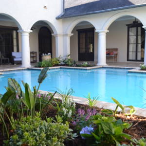 pool with landscaping in forefront