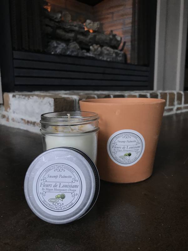 Swamp palmetto scented candle in front of fire place